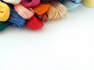 threads for needlework, embroidery, mouline thread, sewing background