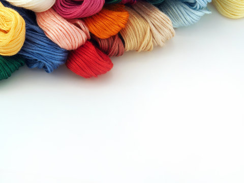 threads for needlework, embroidery, mouline thread, sewing background