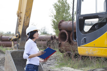 Fototapeta na wymiar Woman engineer on a construction site