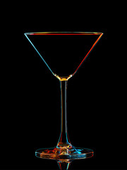Silhouette of colorful martini glass with clipping path on black background.