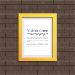 Yellow frame on white brick wall.