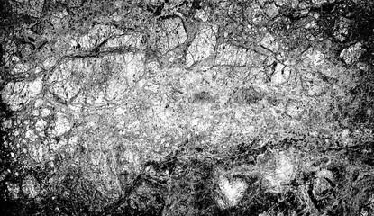 Texture of marble slab macro high contrasted with vignetting effect black and white
