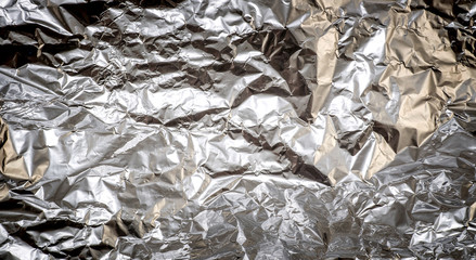 Crumpled aluminum foil texture background