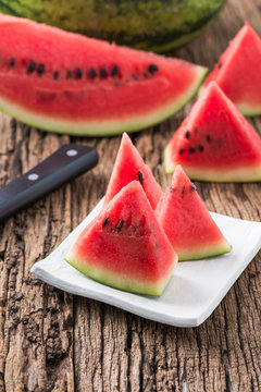 red slice watermelon on white dish