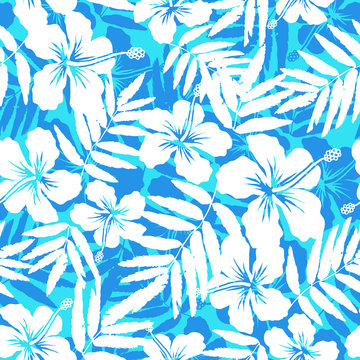 Blue and white tropical flowers silhouettes vector seamless pattern