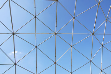 Obraz premium metal structure with blue sky background