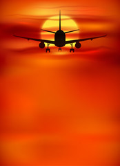 Fototapeta na wymiar Vector orange sunset background with black plane silhouette