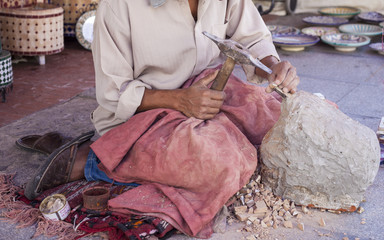 Artisan makes pieces for mosaic craftwork
