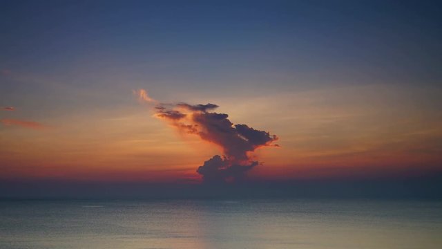 Time lapse of sunrise over sea with stunning cloud formation