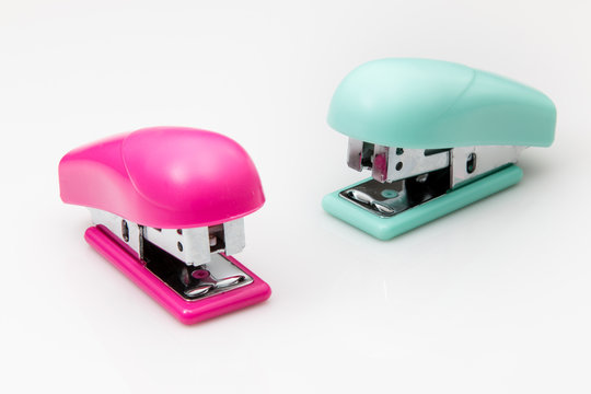 Two Staplers on white background