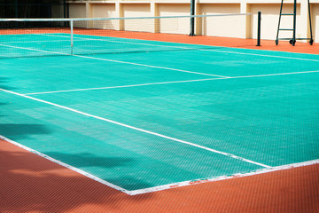 tennis court made with futsal material ground