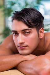 Fototapeta na wymiar Handsome man during spa session