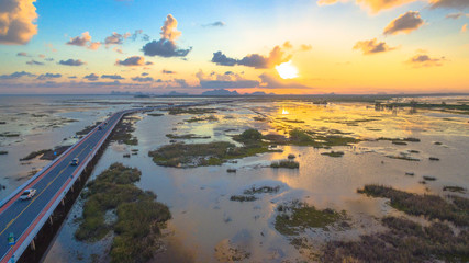 the longest bridge in Thailand it is over the wetlands across the largest waterfowl reserve in the kingdom the bridge connect Talay Noi Phatthalung to Nakhon Sri Thumarach