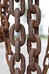 Close up of old rusty metal chain at construction site, old chain, rusty chain