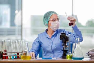 Woman chemist working in the lab