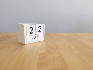 July 22nd.July 22 white wooden calendar on vintage wood abstract