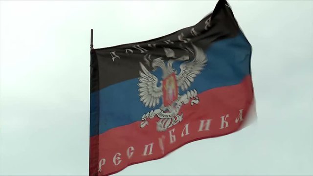 Flag of Donetsk People's Republic of growing in the wind