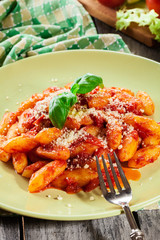 Italian gnocchi with tomato sauce and cheese