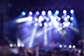 Blurred background of concert illuminations on stage