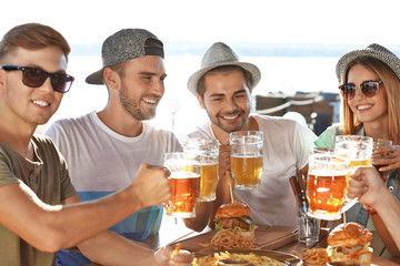 Group of friends hanging out together outdoors