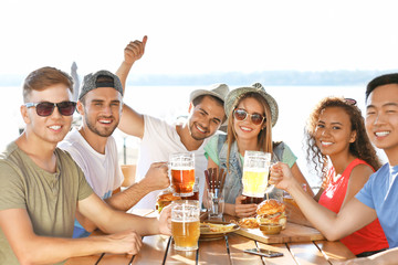 Group of friends hanging out together outdoors