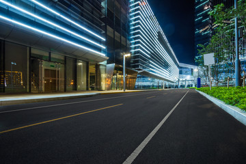 Fototapeta premium clean asphalt road through office block area,suzhou,china.