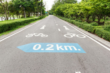 bicycle signs on road at public park