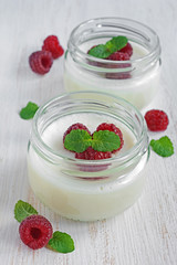 Delicious creamy mousse with fresh raspberries