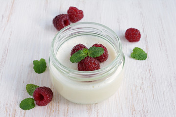 Delicious creamy mousse with fresh raspberries