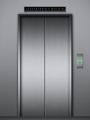 Modern elevator with closed metal doors