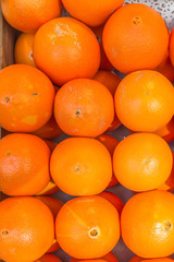 Stack of oranges in a market, useful as background