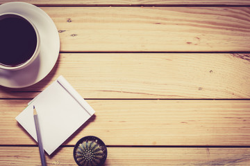 Coffee and notebook on desk work