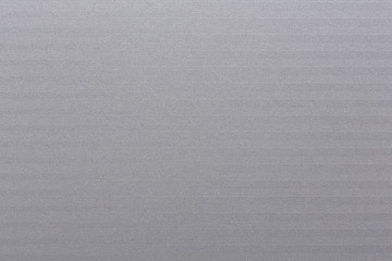 Embossed white paper with paralel bricks pattern.