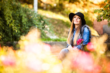 Young lady relaxing in garden