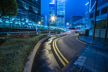 urban road and modern buildings at night,hong kong,china.