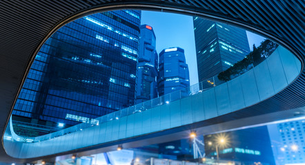 Fototapeta na wymiar view hong kong modern skyscrapers through abstract building,china.
