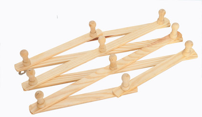 Device for Clothes made of wood. Placed on the white background