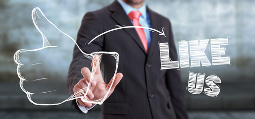 Businessman touching hand drawn thumb up sketch
