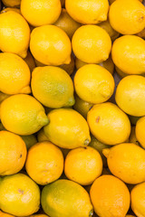 Stack of lemons in a market, useful as background