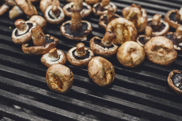 Mushroom barbecue roasted on metal grill