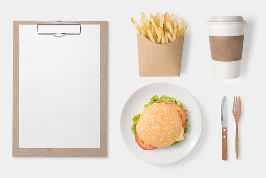 Design concept of mockup burger, french fries, coffee cup and clip board.