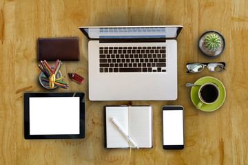 Workspace on wood table, Above view with copy space.