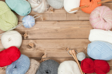 Fototapeta na wymiar Knitting Accessories. Yarn Balls. Wooden Knit Needles. Copy Spac