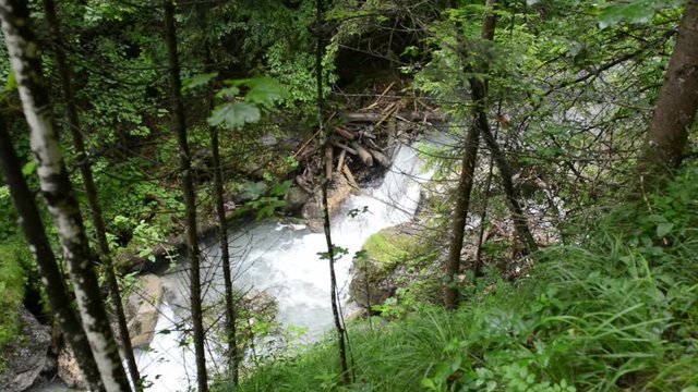  hiking through the Wolfsklamm gorge on stairs. European Alps. Part of Karvendel mountains