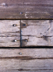 Stara podłoga z desek pozbijanych gwoździami © PawelJakubowski