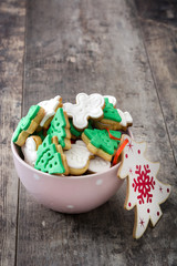 Christmas cookies in a bowl on wooden background


