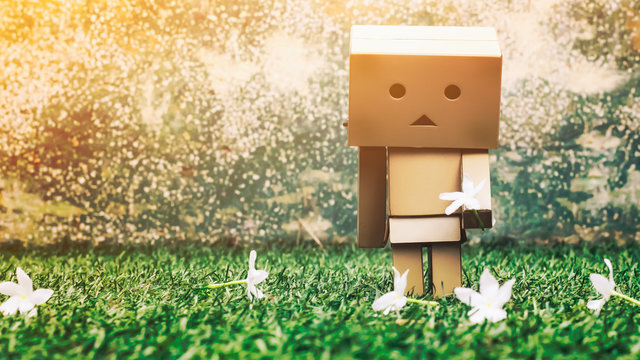 Danbo holding a flowers with the sad face. Danbo first appeared in chapter 28 of the manga,first issued in April 2006.The Japanese company Kaiyodo has produced since late 2007