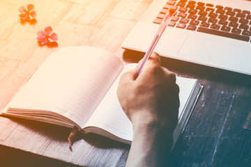 Hand writing on notebook.