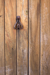 Rusty Door knocker metal antique wood