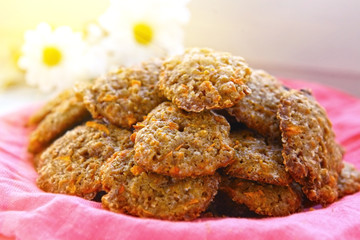 carrot cookies on the cloth with chamomile